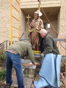 Installation of St. Louis Bertrand bronze statue - Custom design and restoration for churches ...